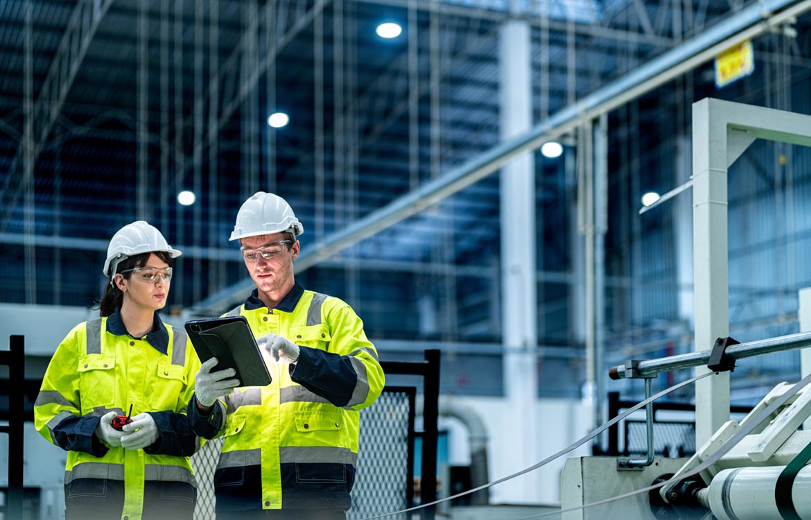 Wokers on a technology manufacturing production line